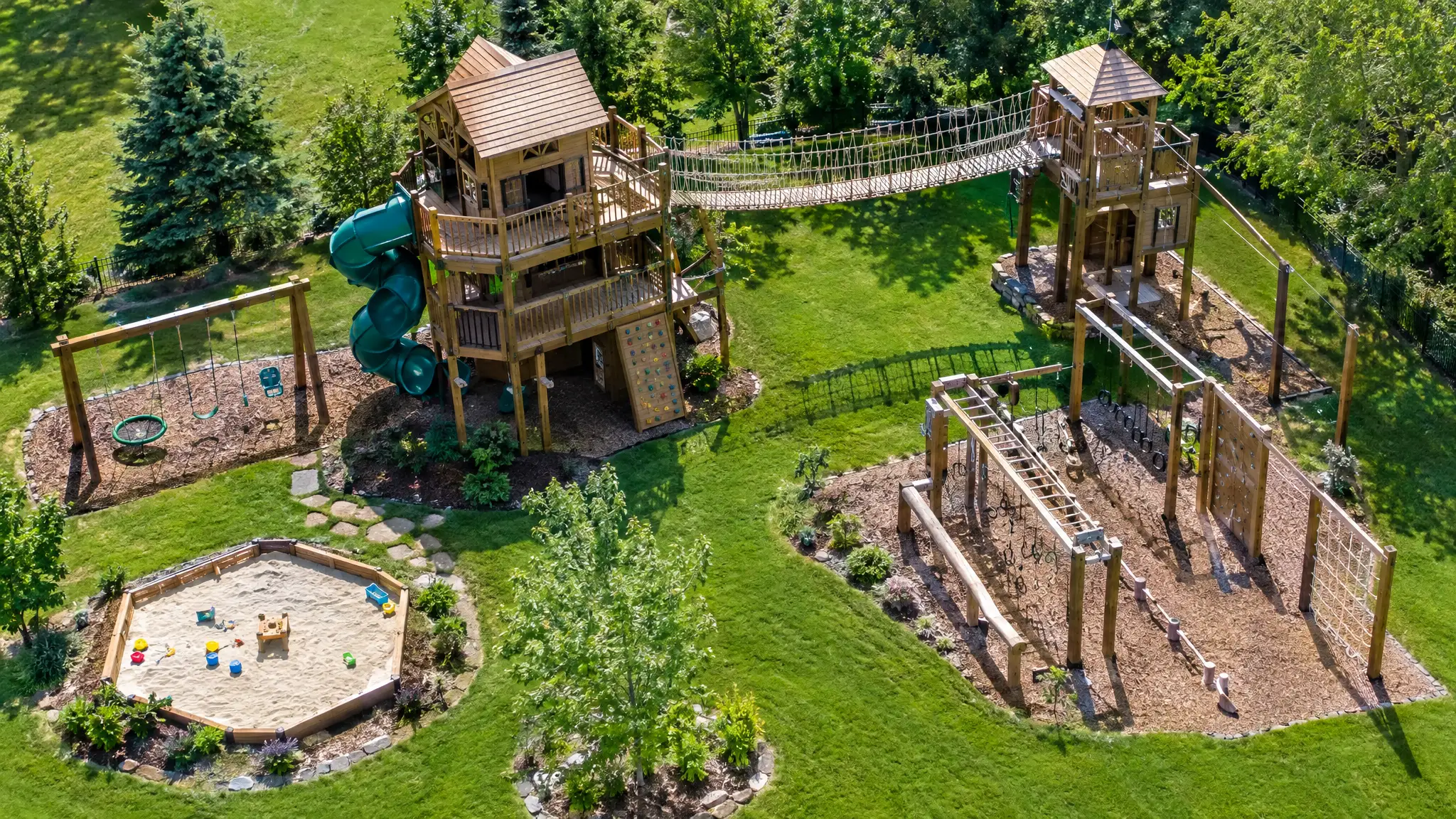 A custom playground built by Swing Set Galaxy
