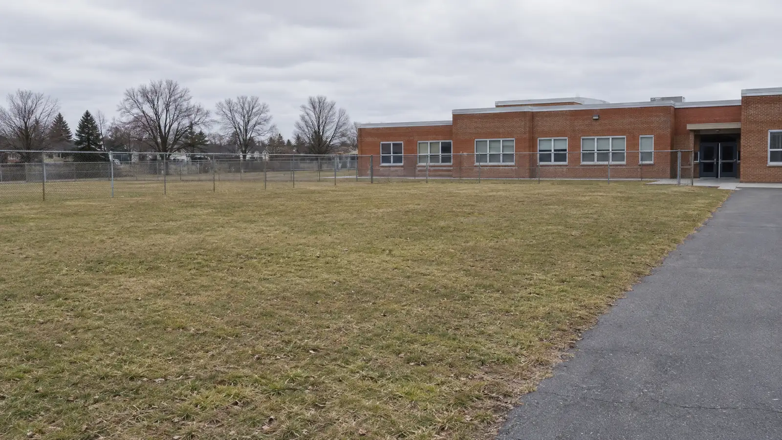 Before: School grounds before and after a commercial play structure